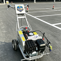 Machine de marquage routier par pulvérisation à froid avec moteur 4 temps pour utilisation sur des projets de longue durée