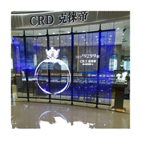 Écran LED maillé haute luminosité P3.91, 3840 Hz, taux de rafraîchissement élevé, mur LED transparent, raccordement sans soudure, animation de façade de bâtiment