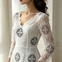 Tissu en dentelle de mousseline blanc brodé floral ajouré à motifs floraux pour robe de mariée, voile et rideau