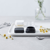 Pots en verre transparent carrés de qualité supérieure avec logo personnalisé et couvercles noirs 3ml 5ml 7ml 9ml pour le reconditionnement cosmétique