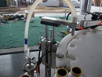Machine de remplissage entièrement automatique en acier inoxydable pour aérosols (parfums, peintures, boissons, produits chimiques) avec moteur à engrenages