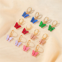 Boucles d'oreilles papillon en or massif, design élégant pour femme