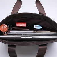 Nouvelle sacoche d'affaires en cuir véritable pour homme, design minimaliste, sac pour ordinateur portable 14 pouces, texture respirante de qualité supérieure, polyvalente