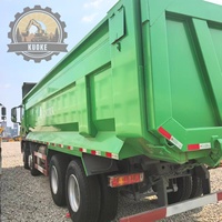 Camion tracteur HOWO TX400 d'occasion, également disponible : HOWO TX371, TX430 en stock. Camions lourds d'occasion Shaanxi Delong, Sany, Caterpillar, Komatsu.