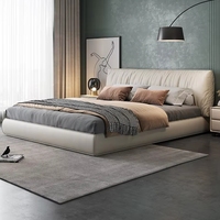 Lit double italien minimaliste de luxe léger en cuir, avec revêtement enveloppant en cuir de vachette première couche et rembourrage souple, avec rangement, pour chambre principale