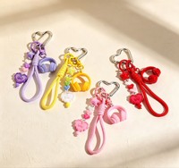 Porte-clés en cordon tressé, pendentif cœur étoile perlé avec breloque casque pour sac, vente en gros