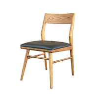 Chaise de salle à manger nordique moderne en bois de frêne massif Siège en cuir noir Chaises de salle à manger Lux pour meubles de restaurant et café