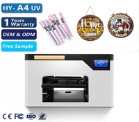 Imprimante UV DTF A4 à large application pour vernis, porte-stylo, boîte d'autocollants UV DTF, trophée en cristal pour petites entreprises