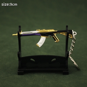 Fábrica al por mayor Mini tamaño miniatura Metal <span class=keywords><strong>Valorant</strong></span> pistola cuchillo espada llavero personalizado juego juguete - Product Image 4