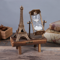 Nouveaux cadeaux : Décoration de tour Eiffel rétro en fer, minuteur à sable. Simple et moderne.