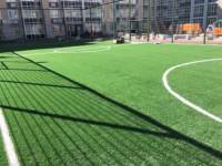 Tapis vert de tapis synthétique de prix d'herbe artificielle pour le terrain de football bon marché et Offre Spéciale