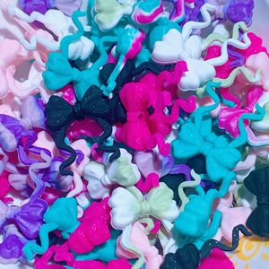 Cuentas de silicona con forma de lazo para la elaboración de joyas, formas de lazo 3D coloridas con colas rizadas, accesorio decorativo de cuentas. - Product Image 1