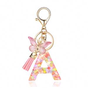 Porte-clés initial en résine 26 lettres avec pendentif papillon et pompon, accessoire élégant pour sac à main femme - Product Image 2