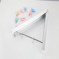 Cintre de corde à linge rétractable en aluminium de conception simple, support mural de couleur noire, support de séchage de vêtements pliant pour hôtel