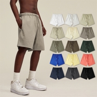 Shorts de basketball en maille pour hommes grandes tailles OEM, couleur unie, anti-plis, vente en gros, haute qualité, taille élastique, respirant, longueur genou, été