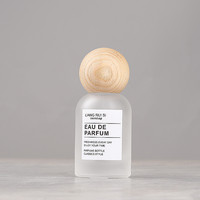 Flacon pulvérisateur en verre de luxe vide de 30 ml et 50 ml avec couvercle rond en bois, épaule ronde, flacon de parfum en verre transparent givré