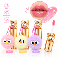 Huile à lèvres en tube métallique doré, brillant à lèvres avec porte-clés pompon oiseau mignon, fabrication OEM personnalisée