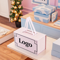 Nouvel arrivage de boîte cadeau de papier d'emballage de chaussures de stockage de couvercle magnétique rose pliable et écologique personnalisé avec poignée en ruban