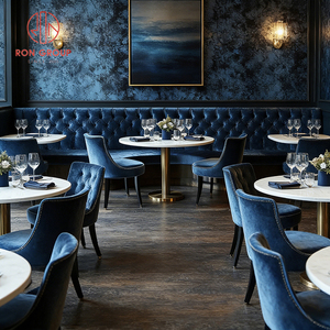 Juego de Muebles de Restaurante Modernos y Lujosos: Sofá de Terciopelo Azul Marino con Botones y Mesa Redonda de Mármol Blanco - Product Image 4