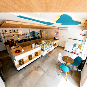 Airy Luxe Bakery & Coffee Market Stall Featuring Glass Display Case, Open Tiered Shelving, and Integrated Warm Lighting - Product Image 4