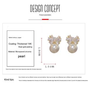 Boucles d'oreilles en cuivre finition or 14 carats, nœud, zircon cubique, perle simulée, fournisseur en gros - Product Image 5