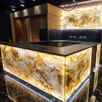 Comptoir de bar lumineux LED commercial de luxe personnalisé en pierre translucide pour boîte de nuit et restaurant