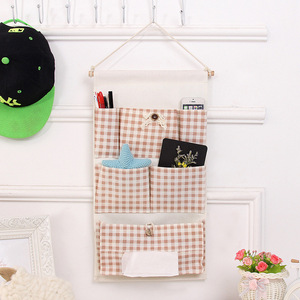 Bolsa de almacenamiento montada en la pared de varias capas con seis bolsillos y cajón para pañuelos, organizador de tela de algodón para puertas y ventanas - Product Image 1