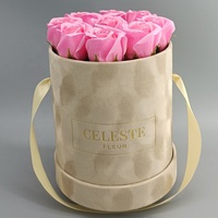 Boîtes cadeaux en carton recyclé rondes en velours de luxe personnalisées en gros avec gaufrage et poignée pour roses