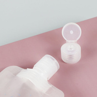 Emballage cosmétique liquide Sac 30ml 50ml 100ml Sac en plastique transparent Pochette à bec avec bouchon rabattable