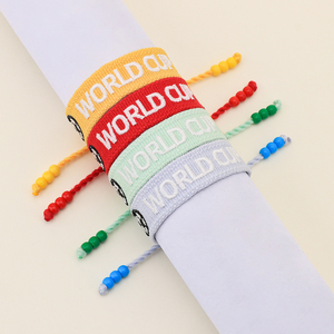 กำไลข้อมือทอผ้าลายโลโก้ฟุตบอลโลกแบบกำหนดเอง กำไลผ้าปักลายส่วนตัวสำหรับแฟนฟุตบอล ของที่ระลึกสำหรับโซนแฟนบอล - Product Image 2