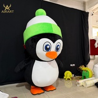 Costume de poupée pingouin en peluche gonflable de dessin animé pour les activités interactives dans les parcs de glace et de neige