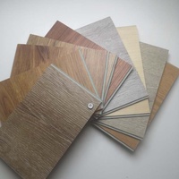 Carreaux de vinyle emboîtables planches pvc clic revêtement de sol ignifuge imperméable clic emboîtement carreaux de sol en plastique pour le salon