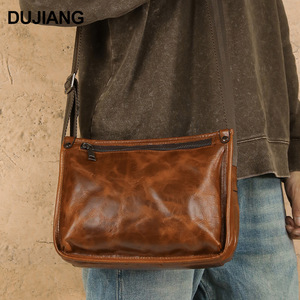 กระเป๋าสะพายข้างผู้ชายดูเจียงหนังแท้กระเป๋าสะพายข้างเคลือบน้ำมันสำหรับเดินทางแบบสบายๆกระเป๋าอเนกประสงค์เรียบง่าย - Product Image 1