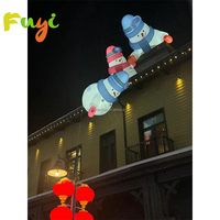 Décoration de Noël géante gonflable personnalisée Fuyi pour toit et affichage commercial