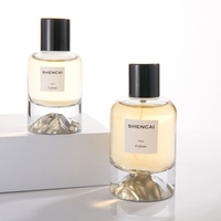 Flacon pulvérisateur de parfum pour femme, cylindrique, transparent et argenté, en verre vide OEM de haute qualité, 30ml, 50ml, 100ml, avec capuchon, modèle 2026