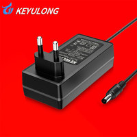 Adaptateur d'alimentation à découpage AC-DC personnalisable multi-prises (UE, US, UK, JP, KR) 5V-24V 1.5A-6A en matériau PC