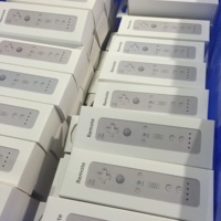 Télécommande Wii avec Motion Plus avec étui en silicone et fonction choc pour dragonne