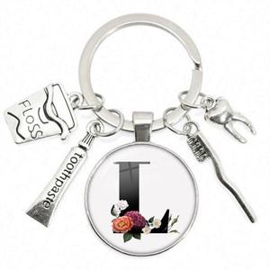 Dentista Regalo de graduación Dentistas Llavero A-z Carta Simulación Cepillo de dientes Pasta de dientes Hilo dental Colgante Dental Llavero de metal - Product Image 6