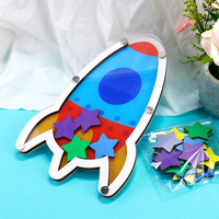 Pot de récompense à motif de fusée en bois pour les enfants avec des étoiles colorées pour motiver les enfants à faire de bonnes manières