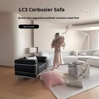 Canapé Corbusier de style européen, minimaliste italien, Bauhaus, noir, une place, luxe léger, en similicuir, avec accoudoirs incurvés et dossier haut