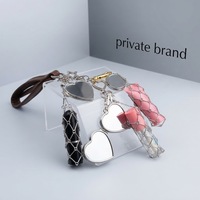Porte-clés en acier inoxydable tendance pour brillant à lèvres et rouge à lèvres avec miroir de maquillage intégré, idéal pour sac