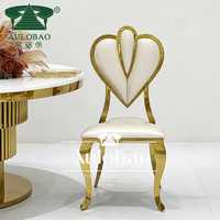 Chaise de salle à manger rembourrée en acier inoxydable doré moderne, utilisée pour les mariages, les hôtels et les banquets
