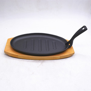 Sartén Ovalada de Hierro Fundido Antiadherente con Base de Madera y Tenedor - Product Image 4