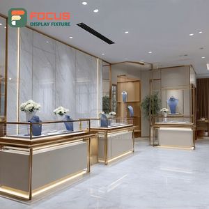 Muebles de Exhibición para Joyería de Lujo Minimalista, Mostrador de Centro Comercial con Acabado Laminado y Vitrina de Vidrio - Product Image 1