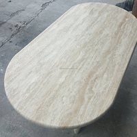 Table à manger ovale en travertin style crème minimaliste pour villa, vente en gros de mobilier de salle à manger