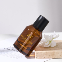 Flacon de parfum en verre cylindrique vide de luxe de 50 ml, couleur ambre, avec bouchon noir