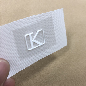 China Supplier Custom Iron On Silicone Labels 2D Raised Embossed Letter Logo Heat <b>Transfer</b> <b>Stickers</b> For Garment - Product Image 1