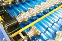Machine de formage à froid pour tôles de toiture double couche, poutrelles et bardages – Matériaux de construction