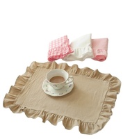 Ensemble de sets de table ronds en coton lavé de luxe, couleur rose pâle et blanc, tissu doux, style minimaliste pour la salle à manger