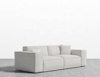 Canapé modulaire carré 3 places en tissu au design moderne et épuré, avec capitonnage haut, idéal pour salon, hôtel, appartement